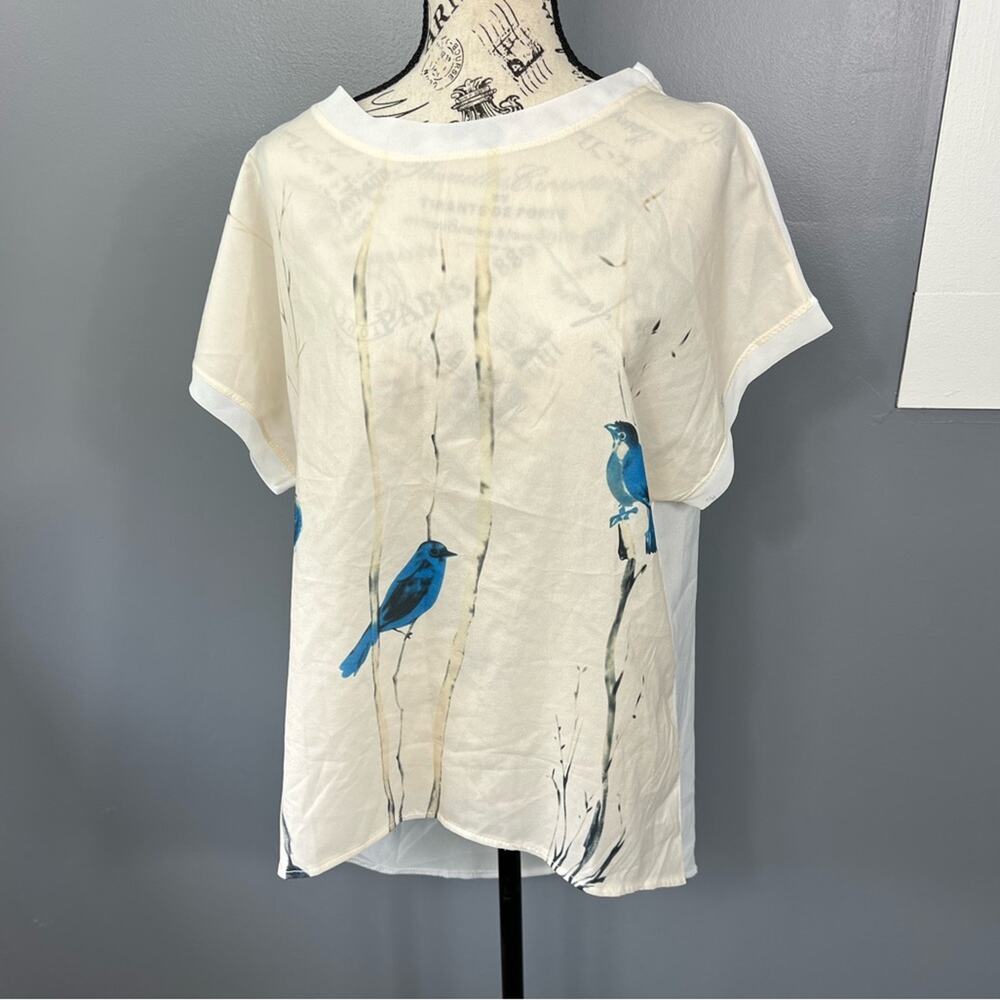 Semi sheer lightweight short sleeve blouse with blue bird design